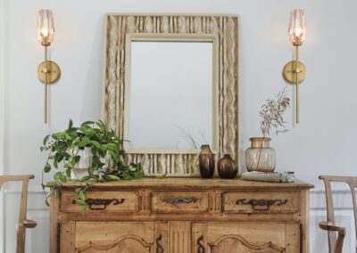 Elegant Dining Room with Gold Sconces